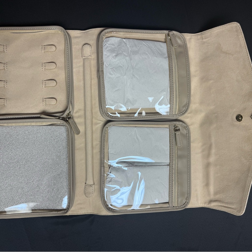 Kendra Scott Beige Travel Jewelry Roll with Clear Zip Pockets